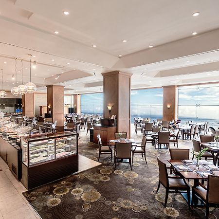 Hotel Ramada Plaza By Wyndham Jeju Ocean Front Exteriér fotografie The Club Lounge at the Hong Kong International Airport