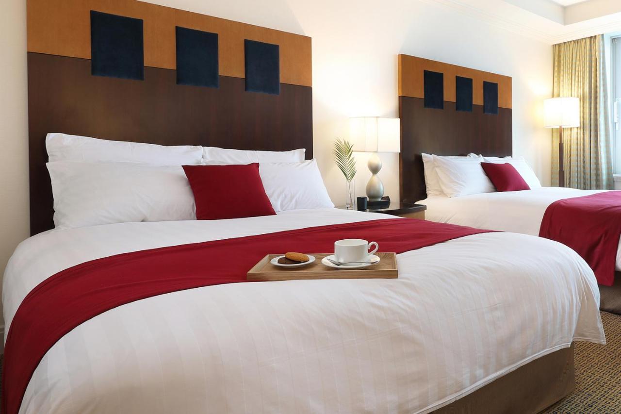 Hotel Ramada Plaza By Wyndham Jeju Ocean Front Exteriér fotografie A guest room at the Hilton Garden Inn
