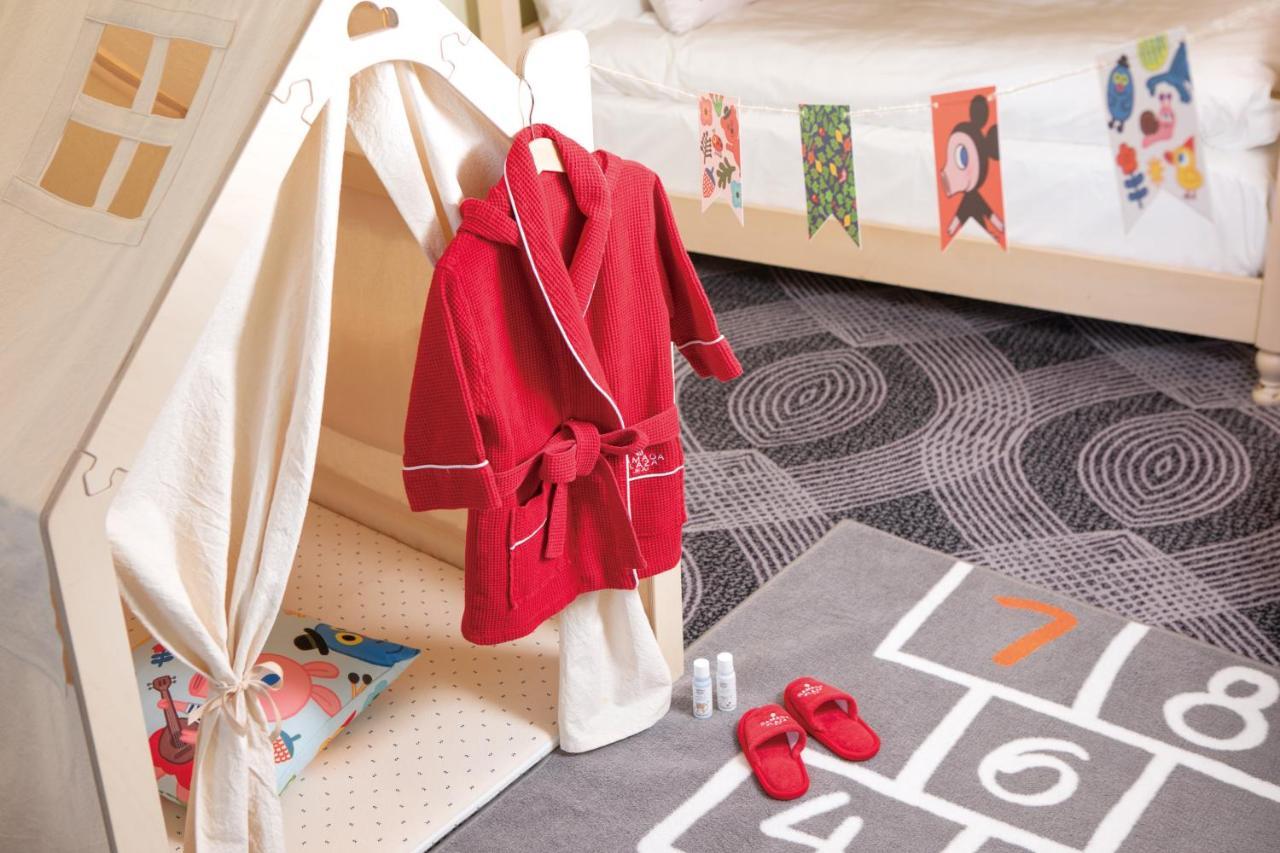 Hotel Ramada Plaza By Wyndham Jeju Ocean Front Exteriér fotografie A bathrobe